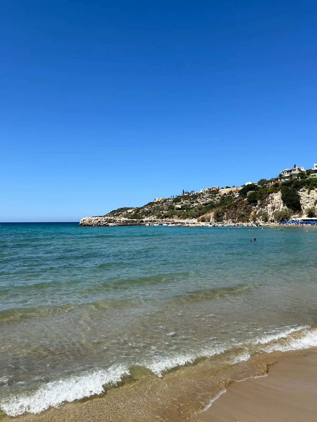 Picturesque harbor and village of Almyrida, situated along the rugged southern coast of Crete.