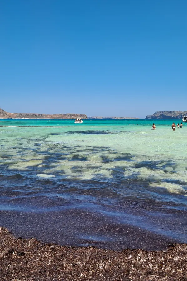 Vast view of the turquoise lagoon and bright white sandy beach at Balos, western Crete