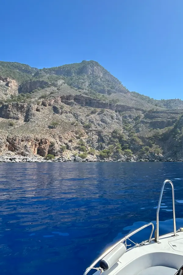 Coastal views and secluded coves near Domata, showcasing the deep blue Mediterranean Sea and Cretan shoreline.