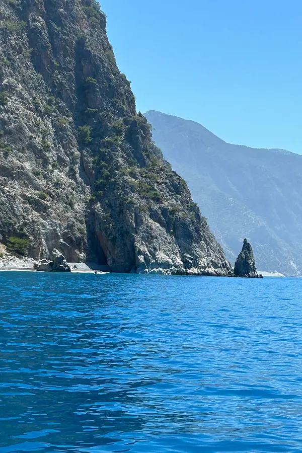 Dramatic coastal views and clear blue waters defining the picturesque Kalogeros cape on the island of Crete.