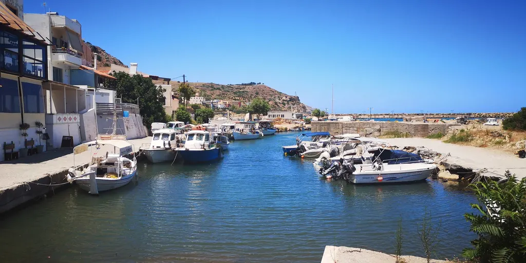 Kolimbari’s rugged coastline featuring dramatic cliffs meeting the deep blue waters of the Cretan sea.