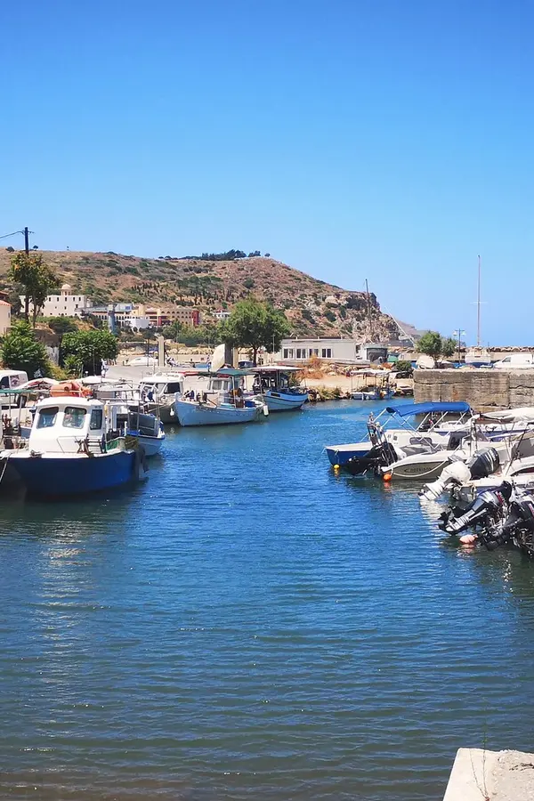 Kolimbari’s rugged coastline featuring dramatic cliffs meeting the deep blue waters of the Cretan sea.