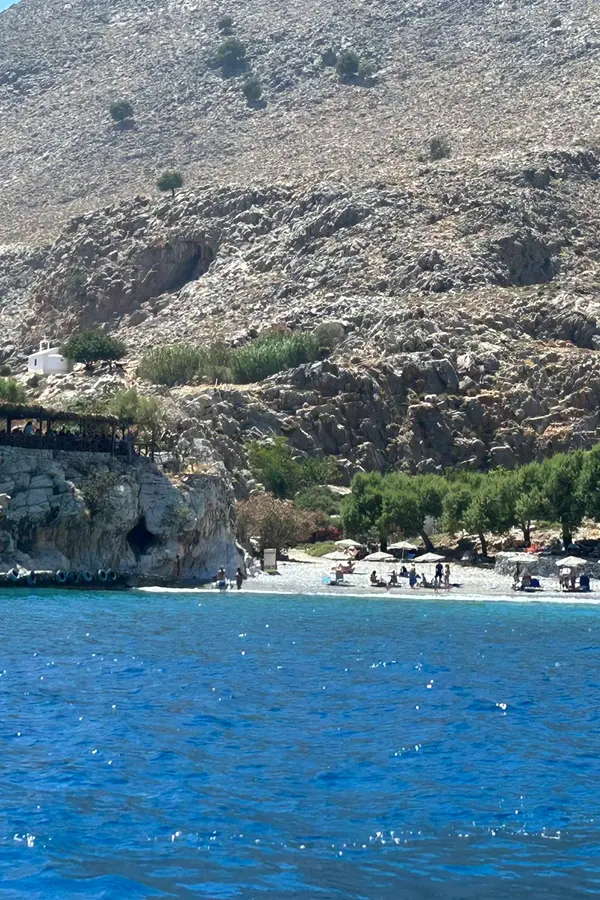 Coastal views of Marmara, showing dramatic cliffs meeting the deep blue waters off the Cretan shore.