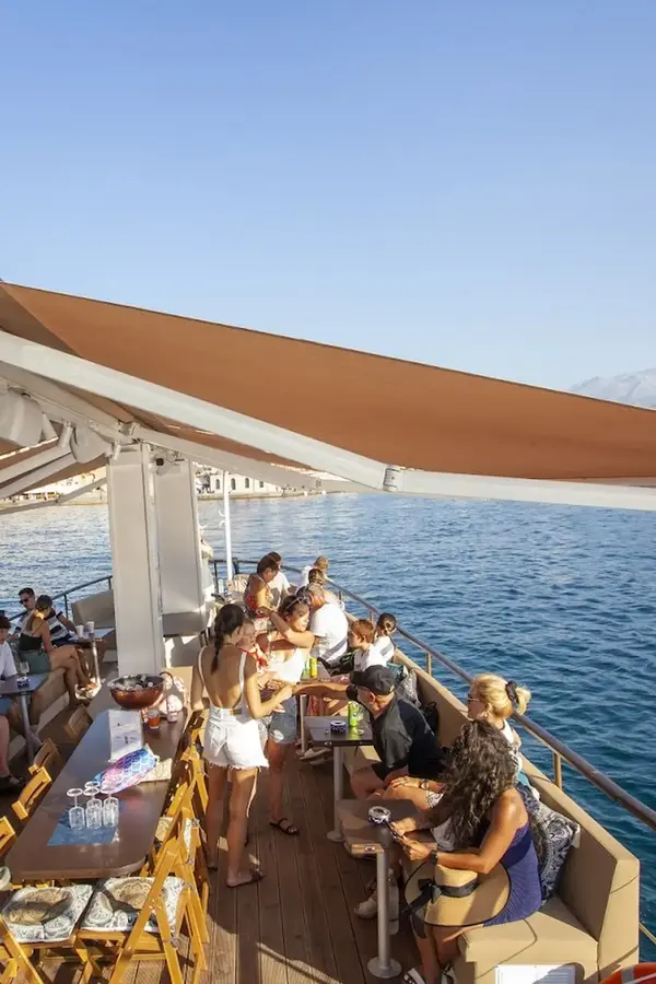 Irini boat deck with people 
