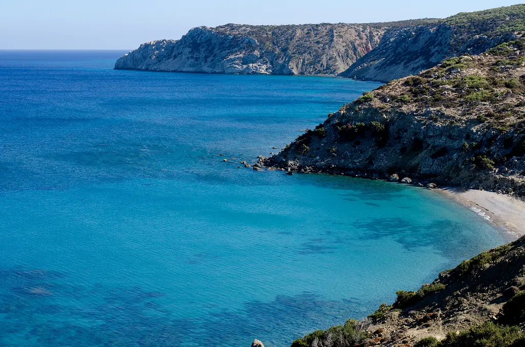 Turquoise waters and dramatic cliffs defining the remote southern coast of Gavdos Island, Crete