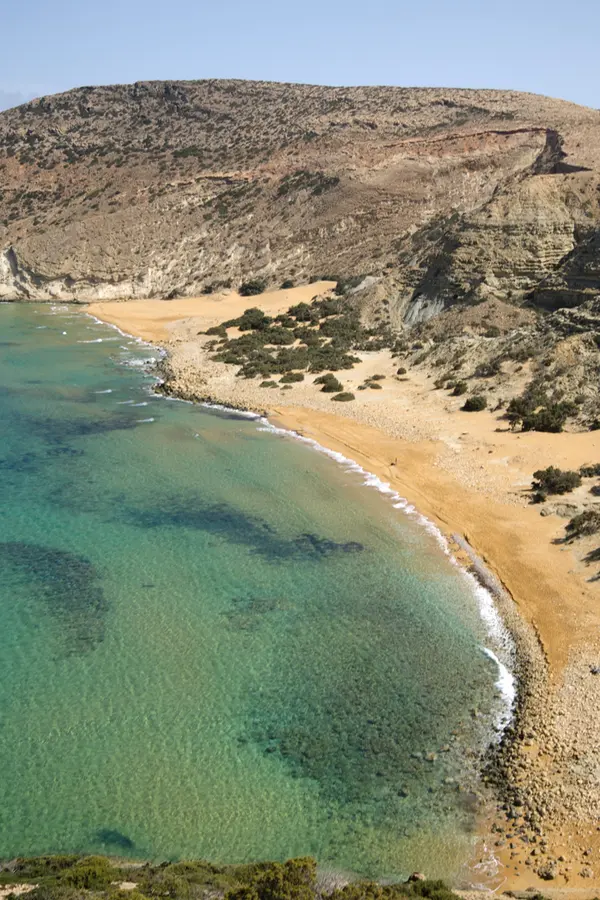 Clear turquoise waters and dramatic coastal views of Gavdos island, located off the southern coast of Crete.