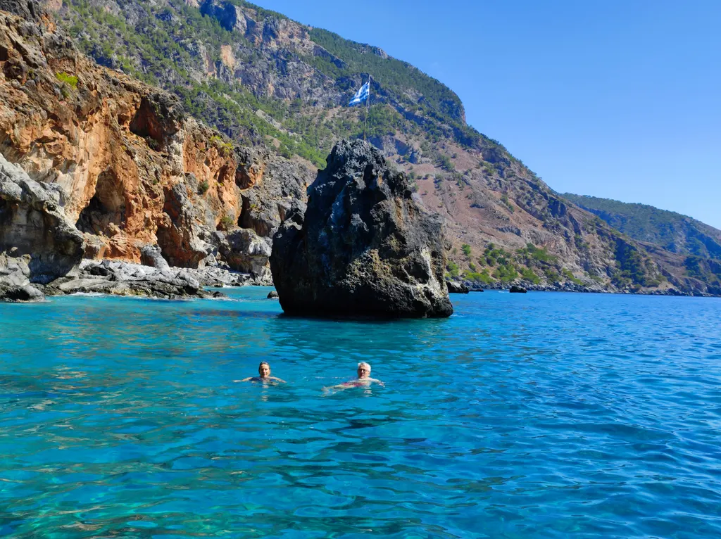 Coastal view showing deep blue waters and rugged land near the owners' property on the Cretan coast.